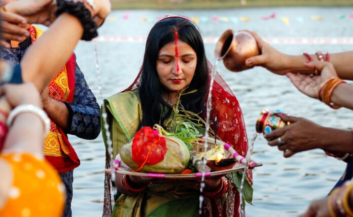 Woman doing Chhath Puja